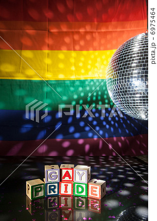 Blocks spelling out gay pride under light of disco ball Blocks spelling out gay pride under light of disco ball 6975464