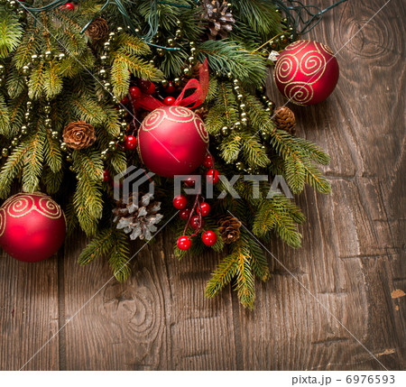 Christmas Decoration. Holiday Decorations over wooden background 6976593