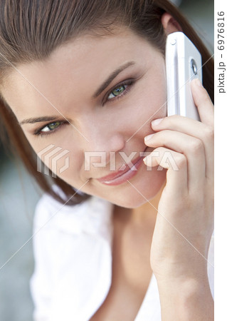 Beautiful Young Woman With Green Eyes On Cell Phone Beautiful Young Woman With Green Eyes On Cell Phone 6976816