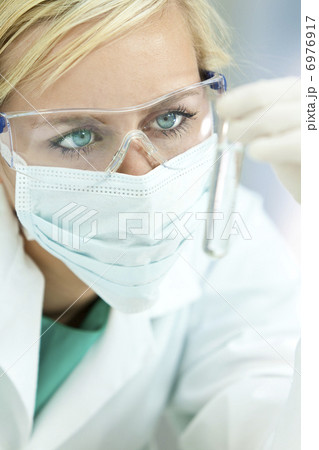 Female Scientist Doctor With Clear Solution Test Tube In Laborat Female Scientist Doctor With Clear Solution Test Tube In Laborat 6976917