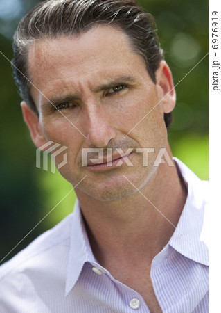 Outdoor Portrait of Handsome Middle Aged Man Outdoor Portrait of Handsome Middle Aged Man 6976919