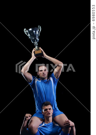 soccer players celebrating victory 6980553