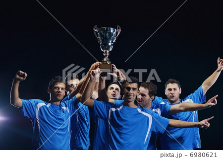 soccer players celebrating victory soccer players celebrating victory 6980621