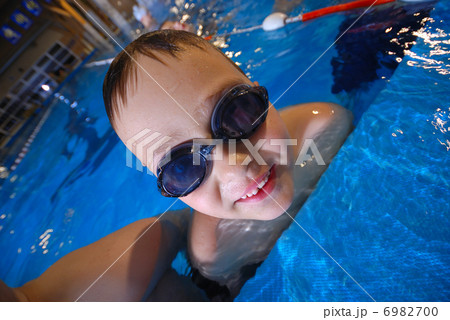 .boy in swimming pool 6982700