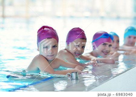 happy children group at swimming pool happy children group at swimming pool 6983040