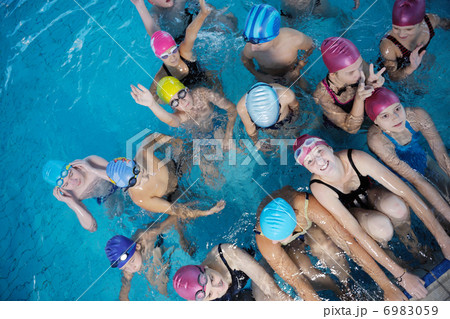 happy children group at swimming pool 6983059