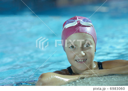 happy child on swimming pool happy child on swimming pool 6983060