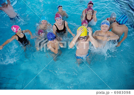 happy children group at swimming pool 6983098