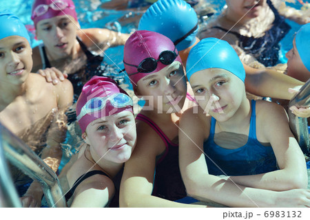 happy children group at swimming pool 6983132