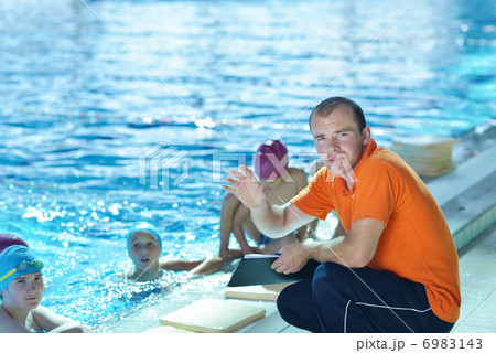 happy children group at swimming pool 6983143