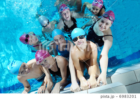 happy children group at swimming pool 6983201
