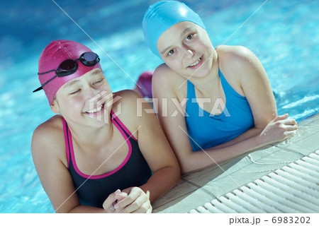 happy children group at swimming pool 6983202