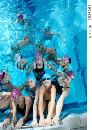happy children group at swimming pool 6983265