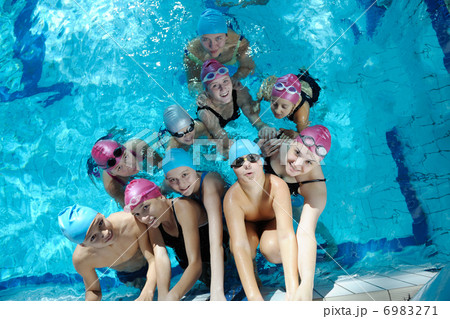 happy children group at swimming pool 6983271