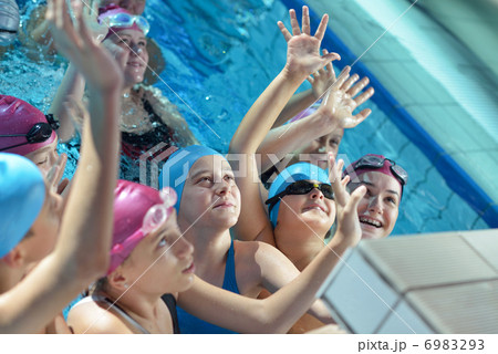 happy children group at swimming pool 6983293