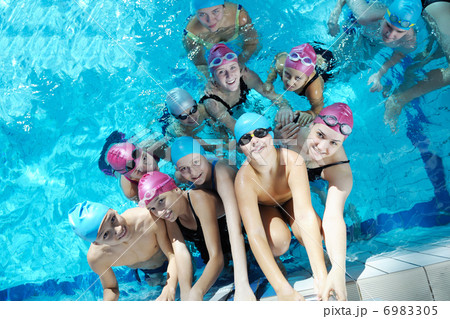 happy children group at swimming pool 6983305