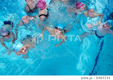 happy children group at swimming pool 6983334