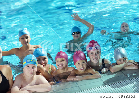 happy children group at swimming pool 6983353