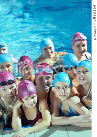 happy children group at swimming pool 6983364