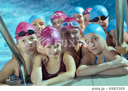 happy children group at swimming pool 6983369