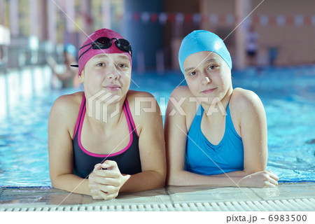 happy children group at swimming pool 6983500