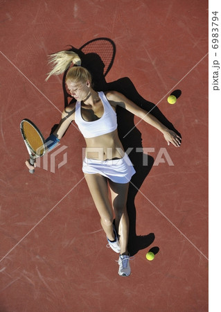 young woman play tennis outdoor 6983794