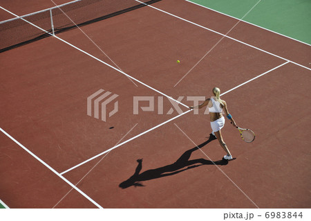 young woman play tennis young woman play tennis 6983844
