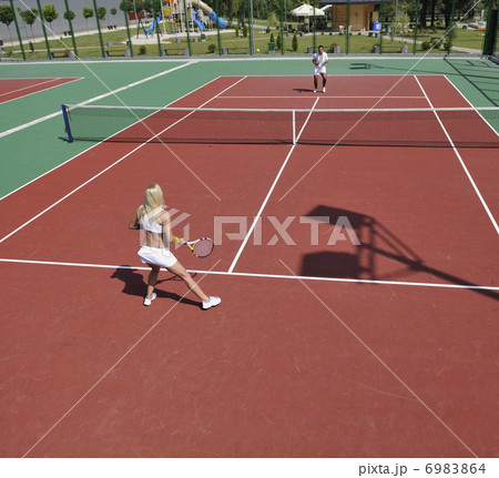 young woman play tennis game outdoor young woman play tennis game outdoor 6983864