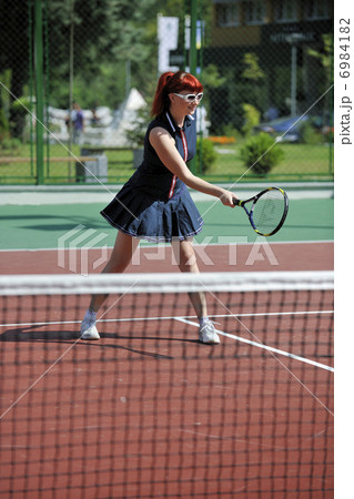 young woman play tennis game outdoor young woman play tennis game outdoor 6984182
