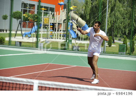 young man play tennis outdoor young man play tennis outdoor 6984196