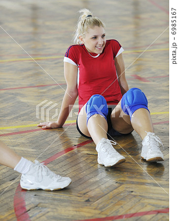 girls playing volleyball indoor game girls playing volleyball indoor game 6985167