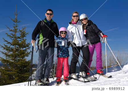 portrait of happy young family at winter 6989912