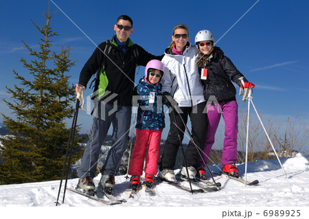 portrait of happy young family at winter 6989925