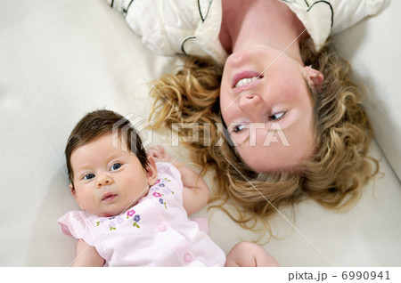 young mother and baby relaxing young mother and baby relaxing 6990941