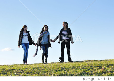 group of teens have fun outdoor group of teens have fun outdoor 6991812