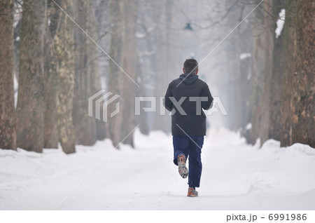one older man running at alley one older man running at alley 6991986