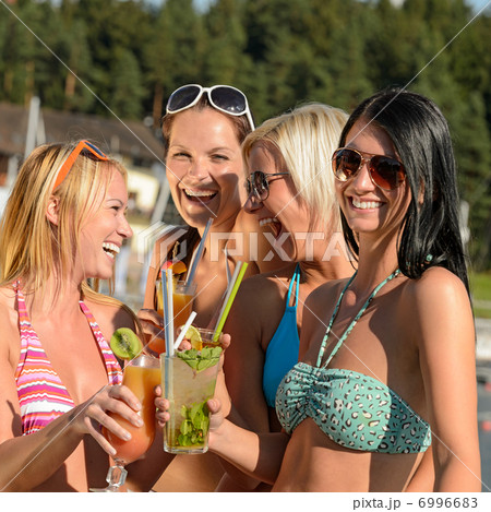 Young women in bikini partying with cocktails 6996683