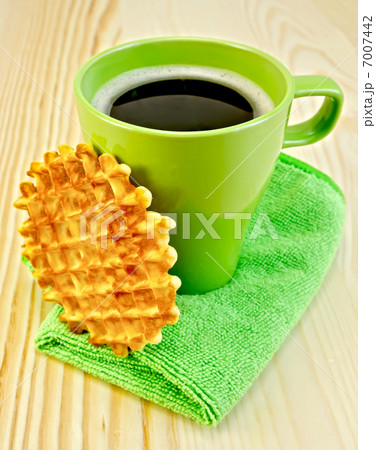 Waffles circle with a green mug on the board 7007442