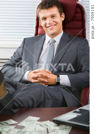 Business man relaxing Business man relaxing 7009191