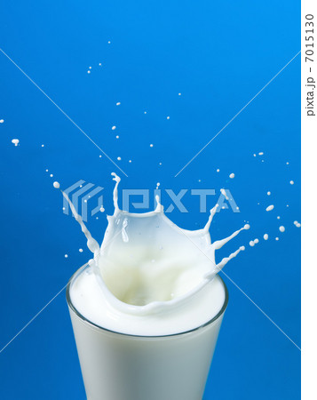 pouring to a glass of milk pouring to a glass of milk 7015130