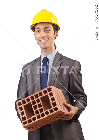 Businessman with bricks on white 7017162