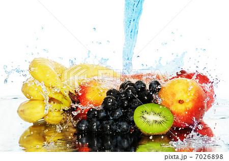 Pure fruit in a spray of water 7026898