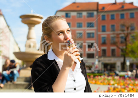 Young woman eats Ice cream 7031484