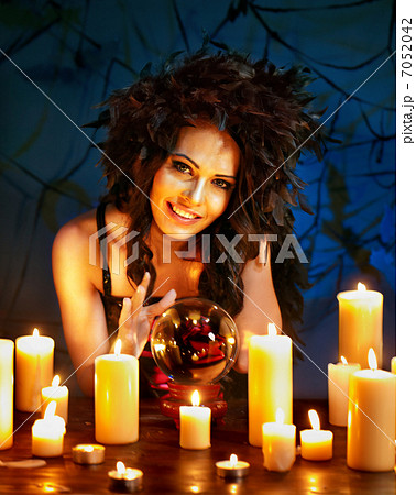 Young woman with crystal ball. Young woman with crystal ball. 7052042