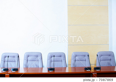Conference hall with microphones 7087869