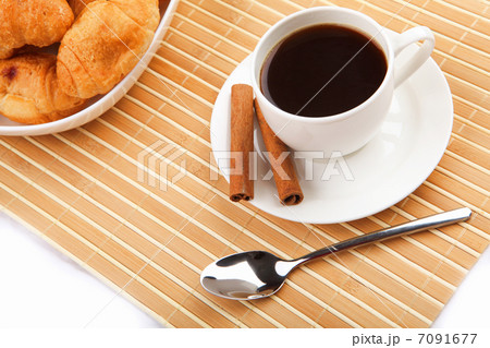 Breakfast coffee and croissants Breakfast coffee and croissants 7091677