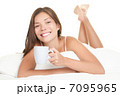 Bed woman drinking tea 7095965