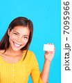 Woman showing business card / sign 7095966