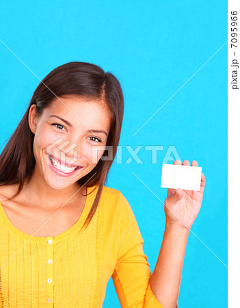 Woman showing business card / sign 7095966