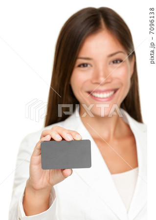 Smiling business woman with blank card Smiling business woman with blank card 7096138
